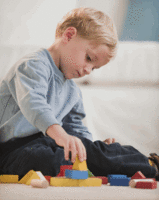 child playing with blocks